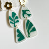 Abstract Drops With Floral Posts