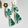 Abstract Drops With Floral Posts