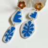 Abstract Drops With Floral Posts
