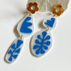 Abstract Drops With Floral Posts